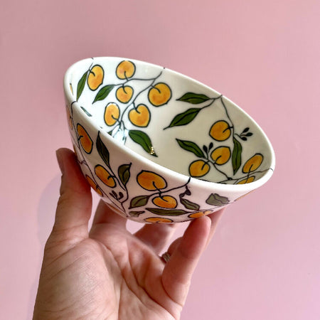 Handmade porcelain ceramic small bowl with peach design