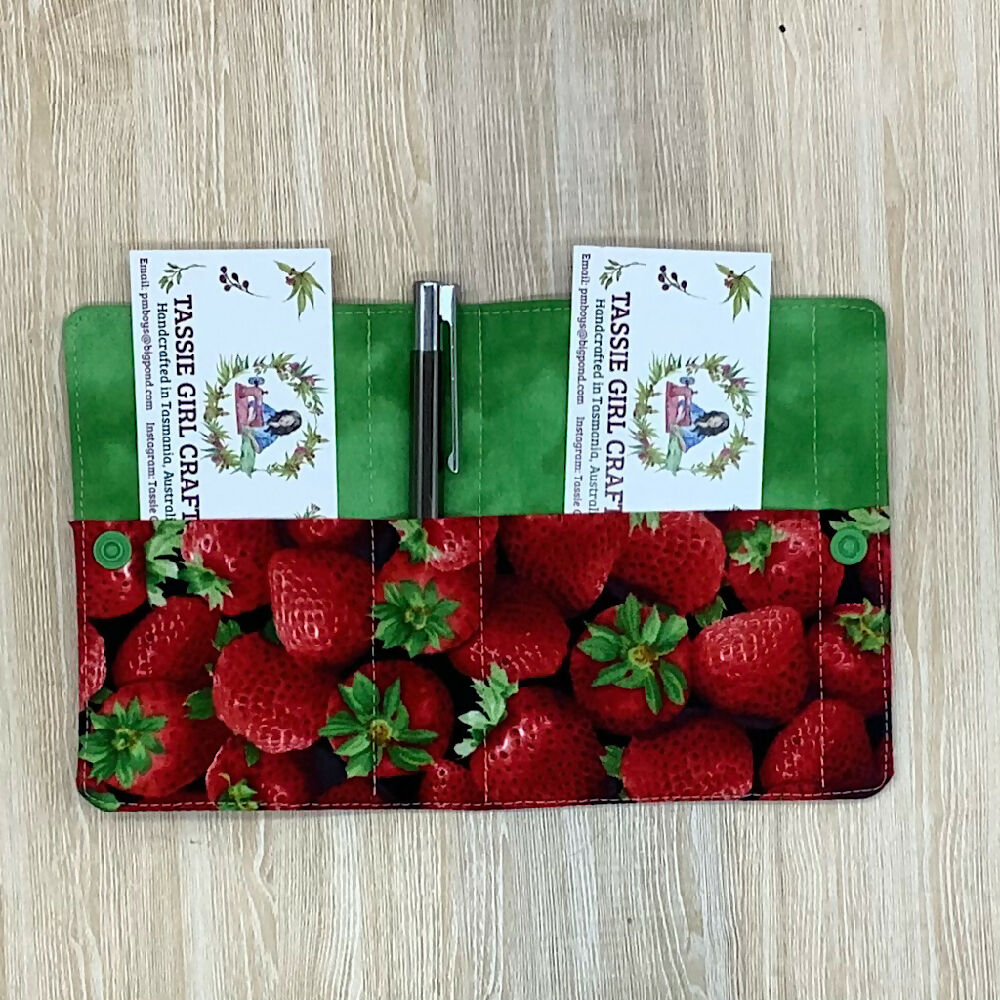 Strawberries refillable fabric pocket notepad cover with snap closure. Incl. book and pen.