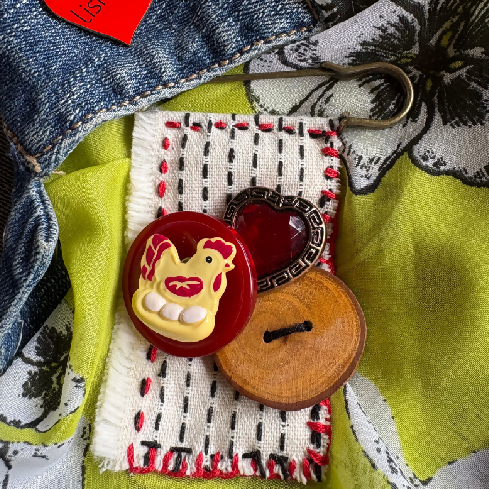 Hand stitched chicken bead brooch by Leumesin Handmade