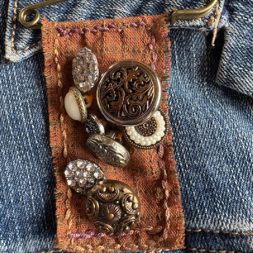 Buttoned and hand stitched brooch by Leumesin Handmade
