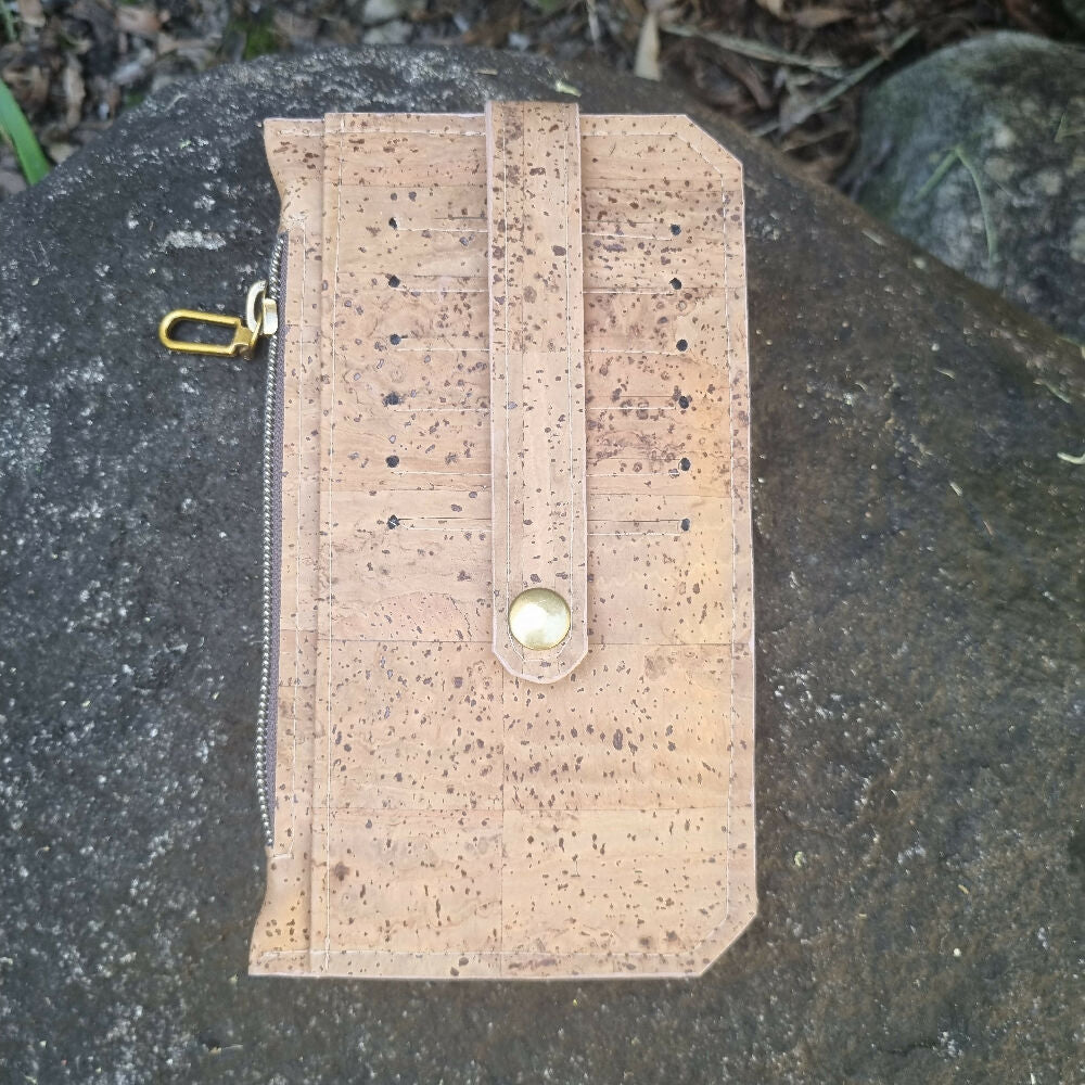 Cork wallet rear view showing six card slots and a tab closure.