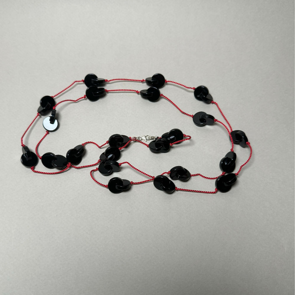 interlocking onyx necklace flat