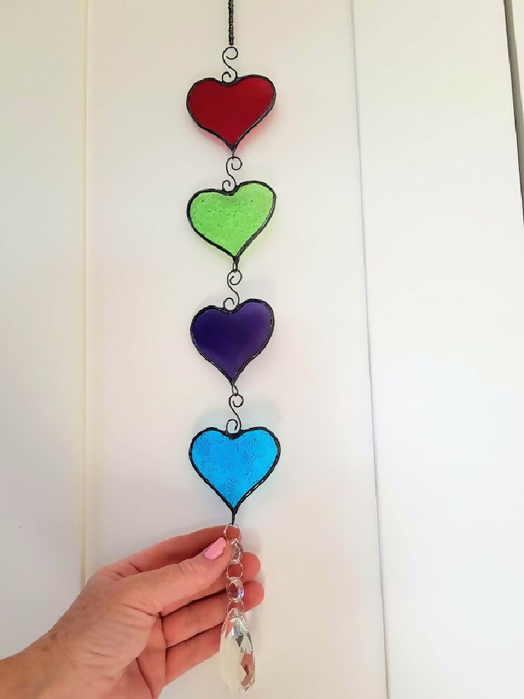 four colourful stained glass hanging hearts, hanging chain of hearts