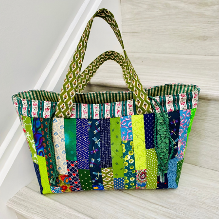 Blue and green patchwork drawstring bag