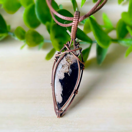 Elegant 64x19mm Wire-Wrapped Fossilised Palm Root Pendant