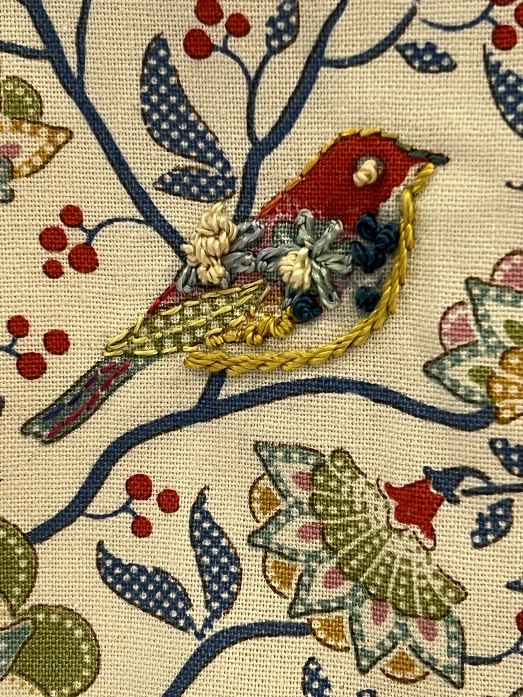 Padded pouch bag with lift up flap