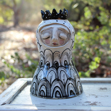 black and white clay sculpture candlestick