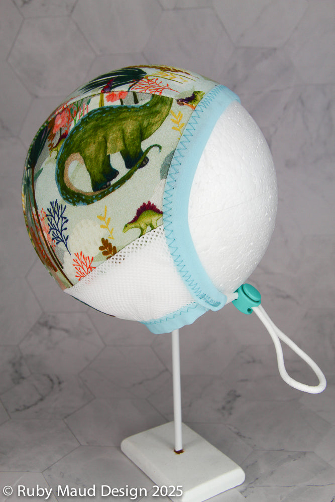 Hearing Aid Bonnet Pilot Cap - Dinosaurs