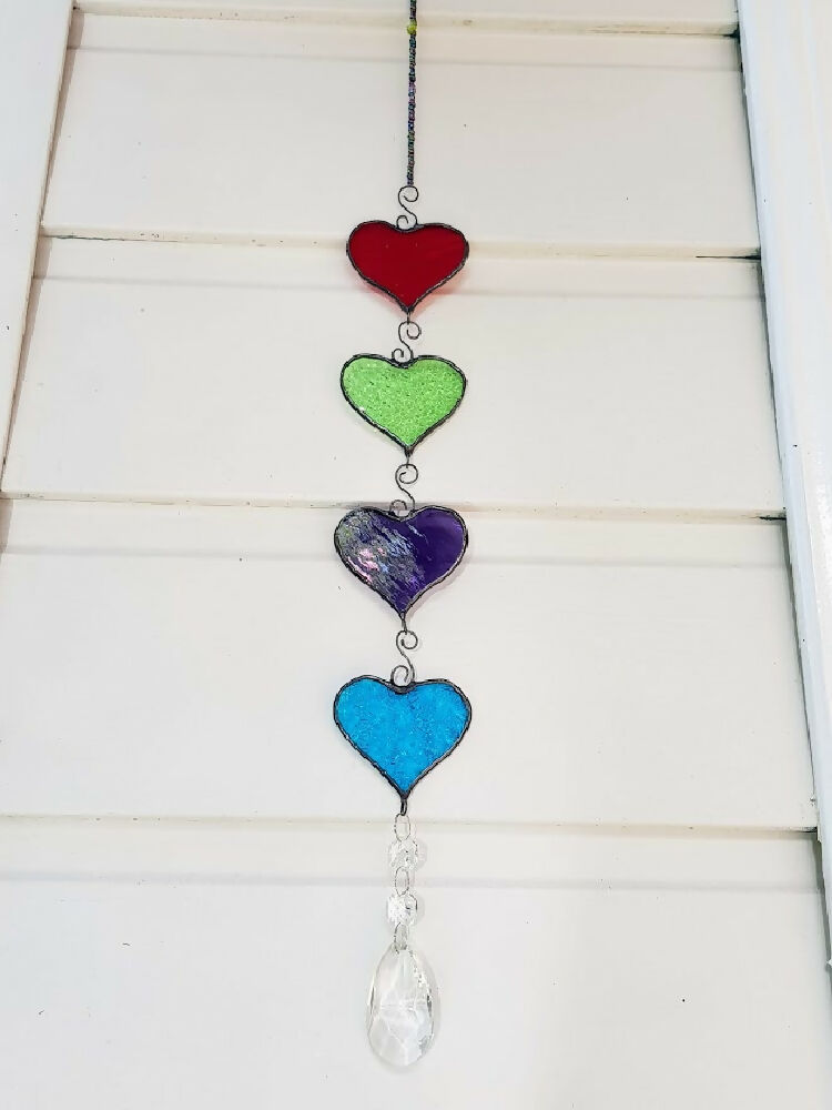 four colourful stained glass hanging hearts, hanging chain of hearts