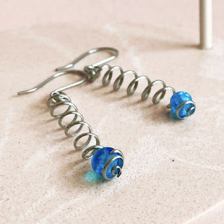 Simply spiralling dangle earrings in stainless steel