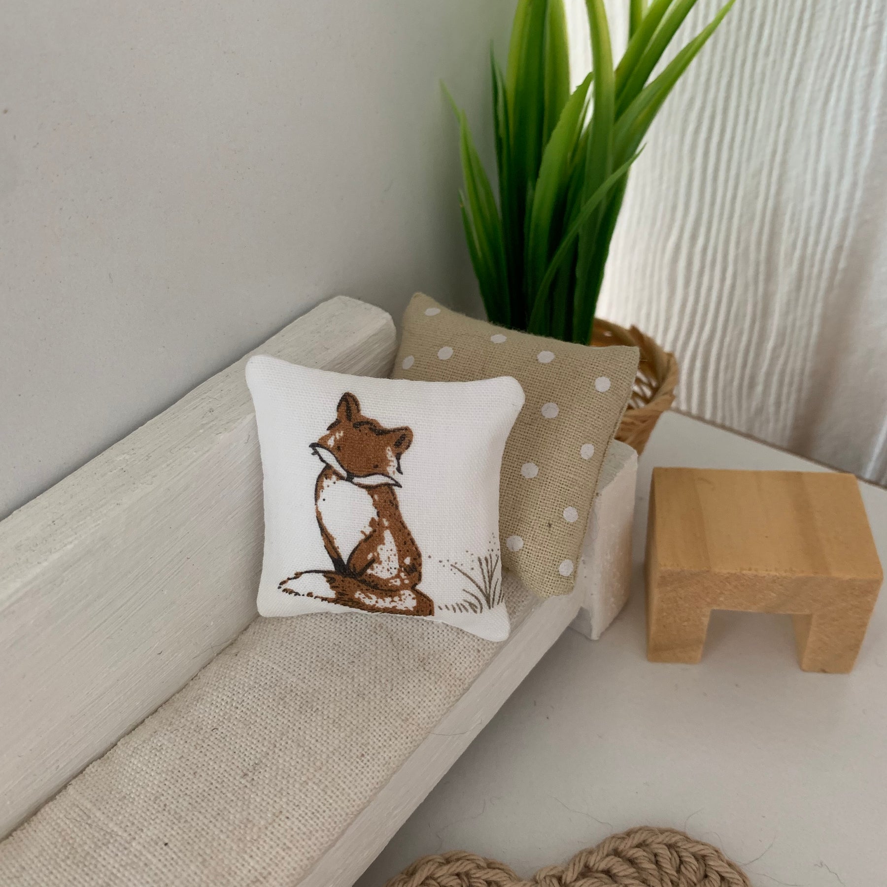 Miniature woodland throw pillows, dollhouse cushions.