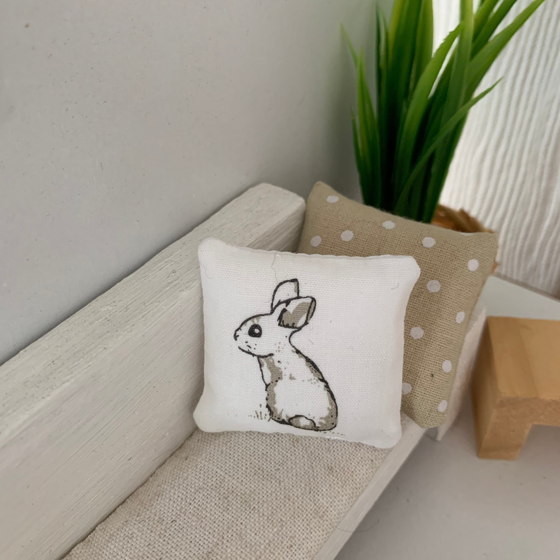 Miniature woodland throw pillows, dollhouse cushions.