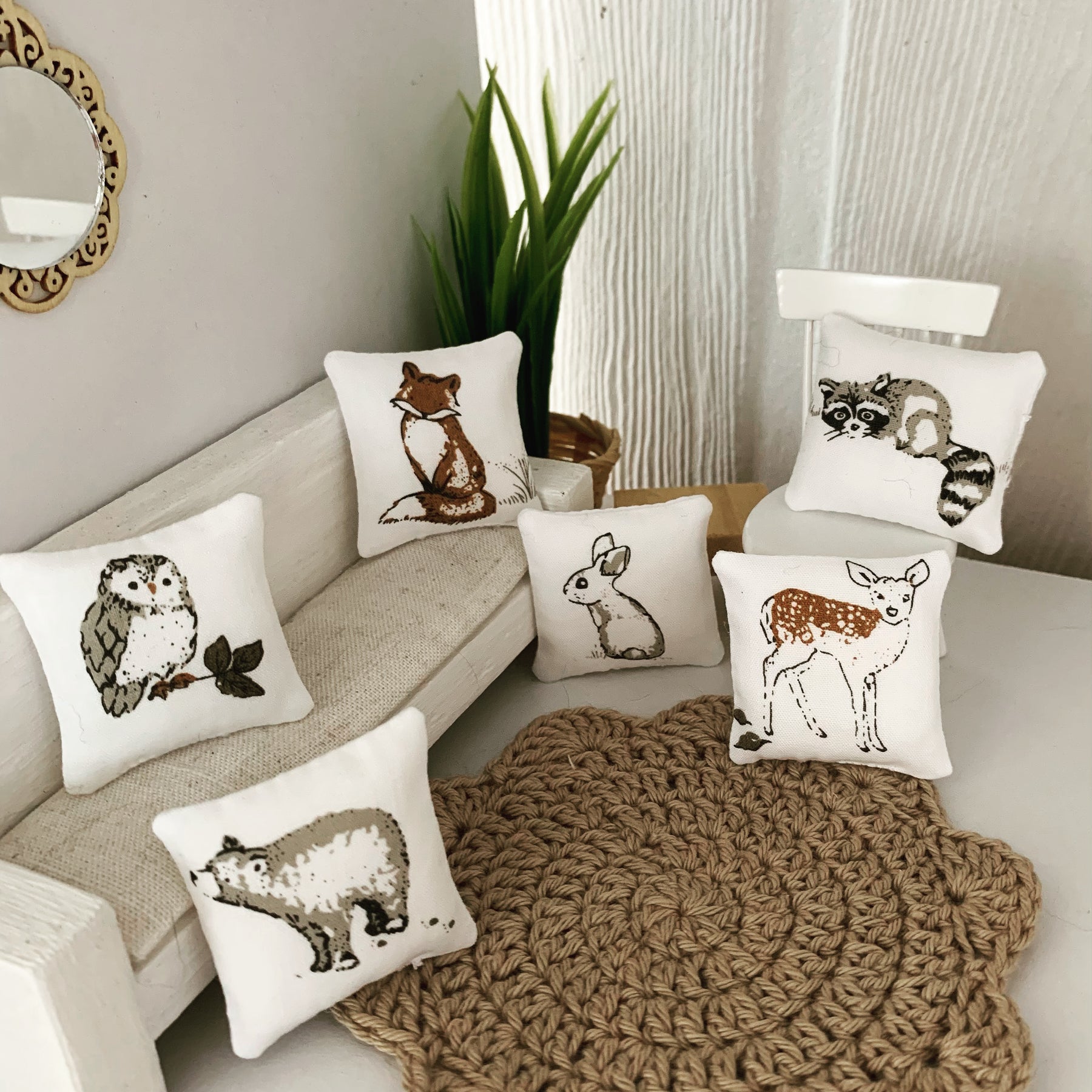 Miniature woodland throw pillows, dollhouse cushions.
