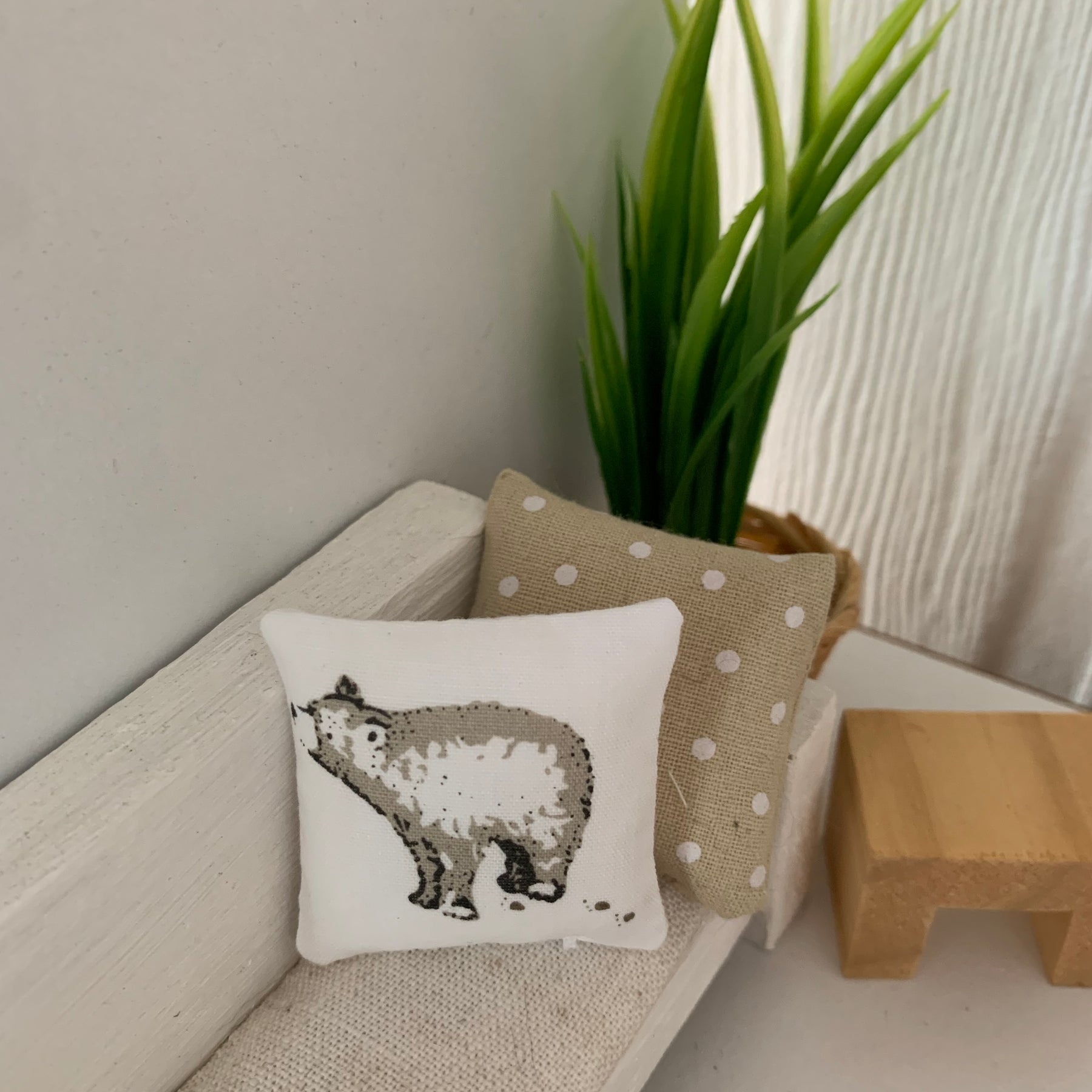 Miniature woodland throw pillows, dollhouse cushions.