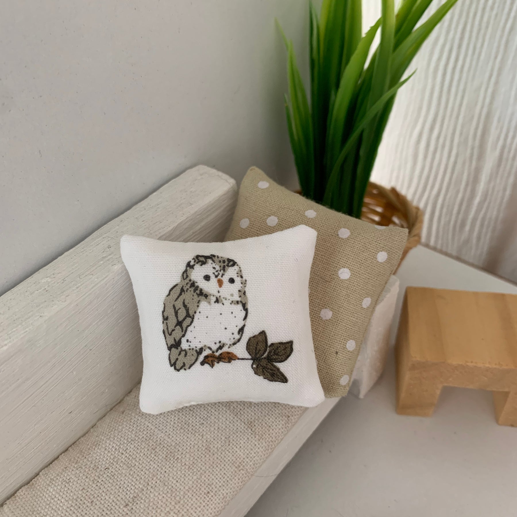 Miniature woodland throw pillows, dollhouse cushions.