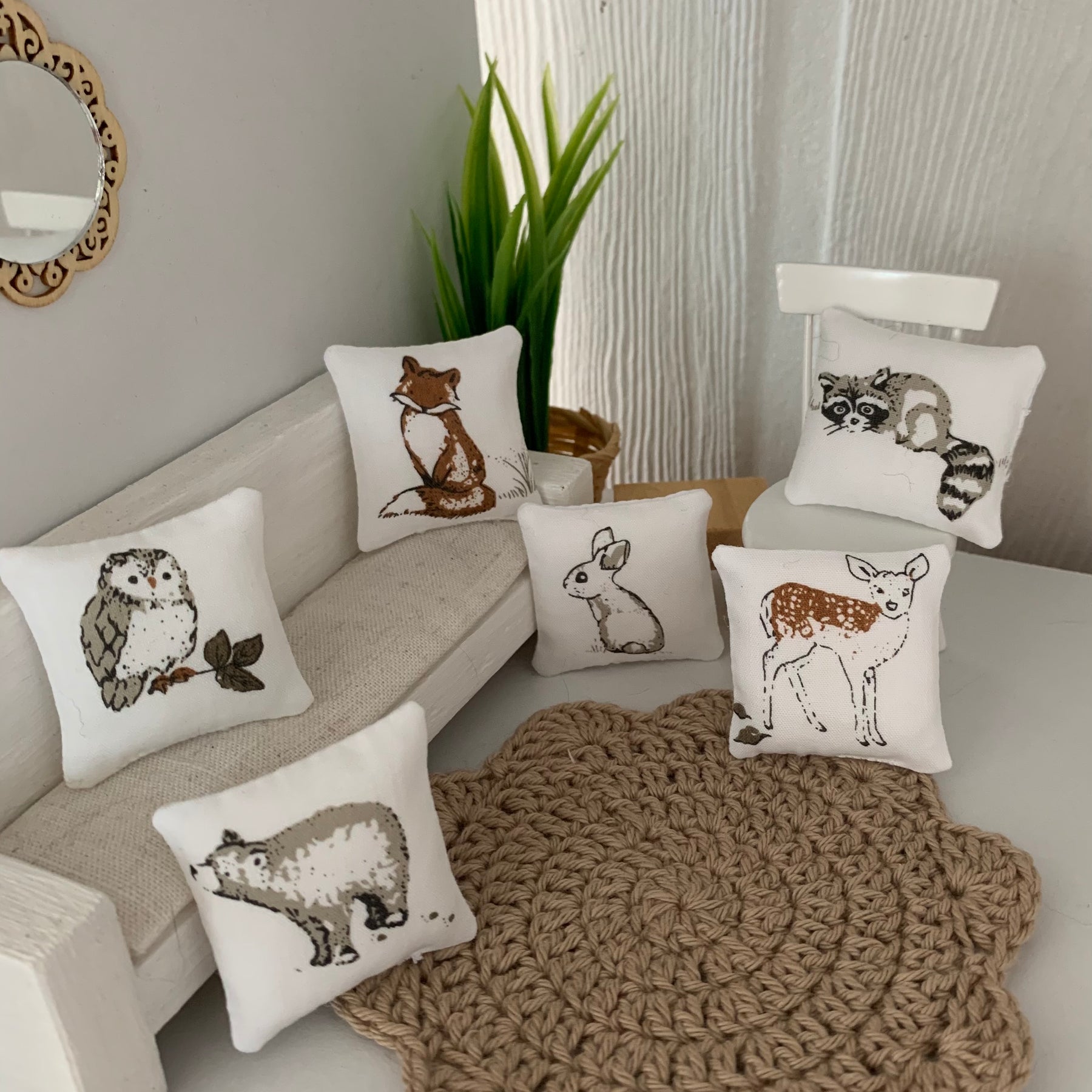 Miniature woodland throw pillows, dollhouse cushions.