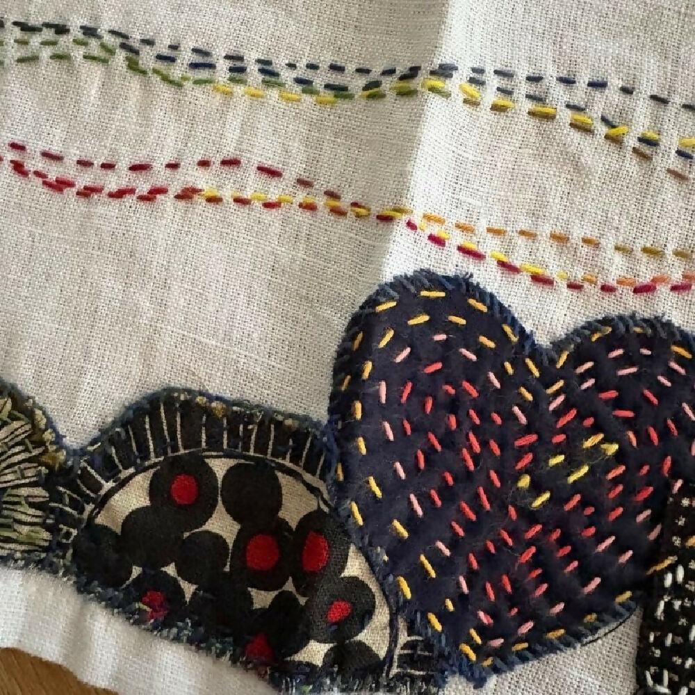 Detail from Lucky Cat handstitched linen teatowel by Leumesin Handmade