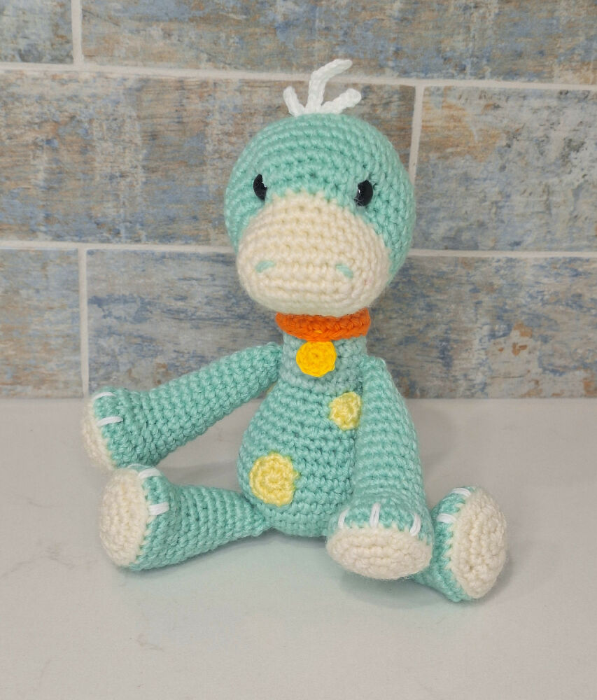 Hand made Dotty the dinosaur crocheted toy