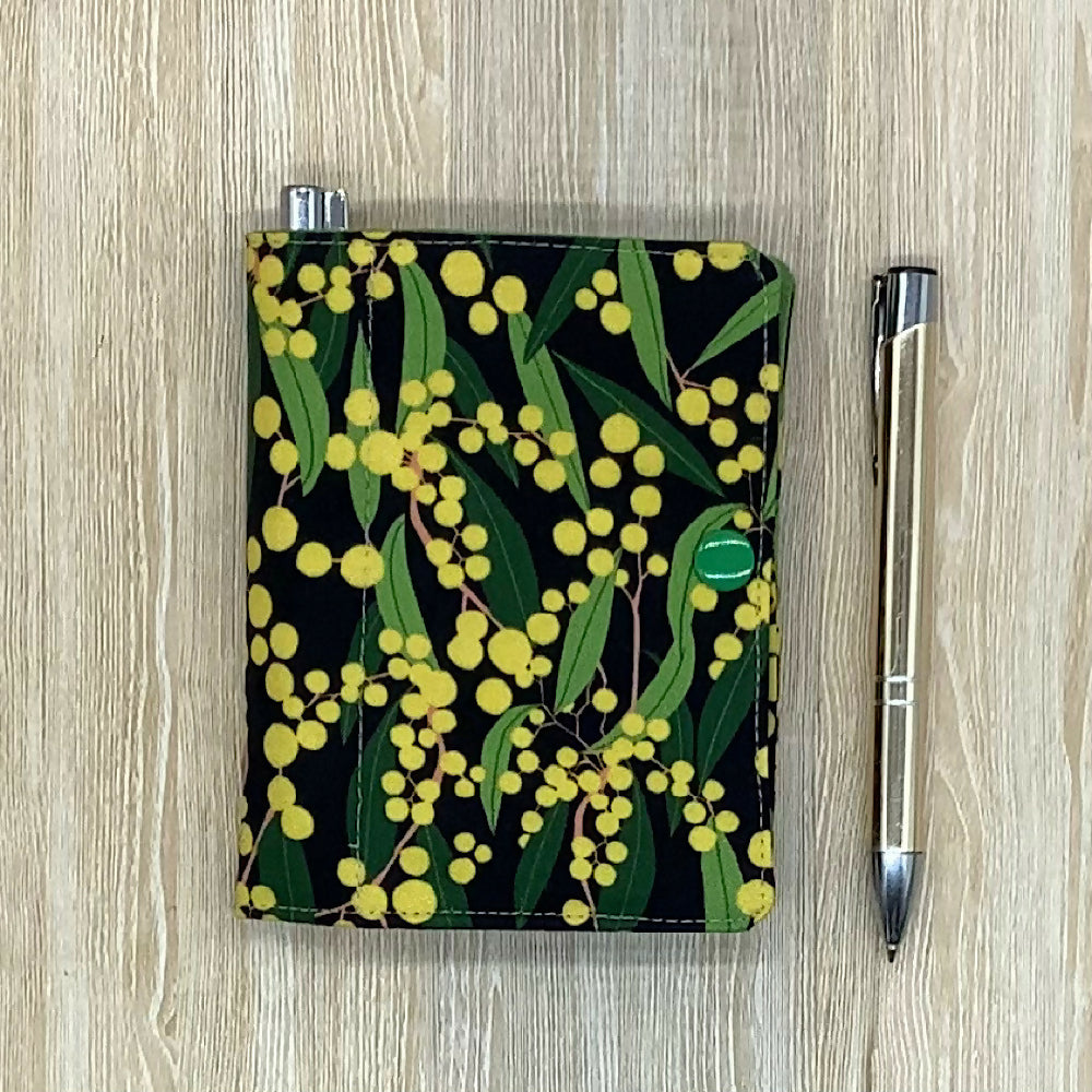 Australian Wattle refillable fabric pocket notepad cover with snap closure. Incl. book and pen.