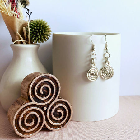 Chunky silver spiral dangle earrings