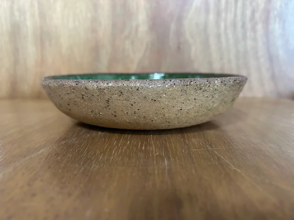 Green pottery bowl