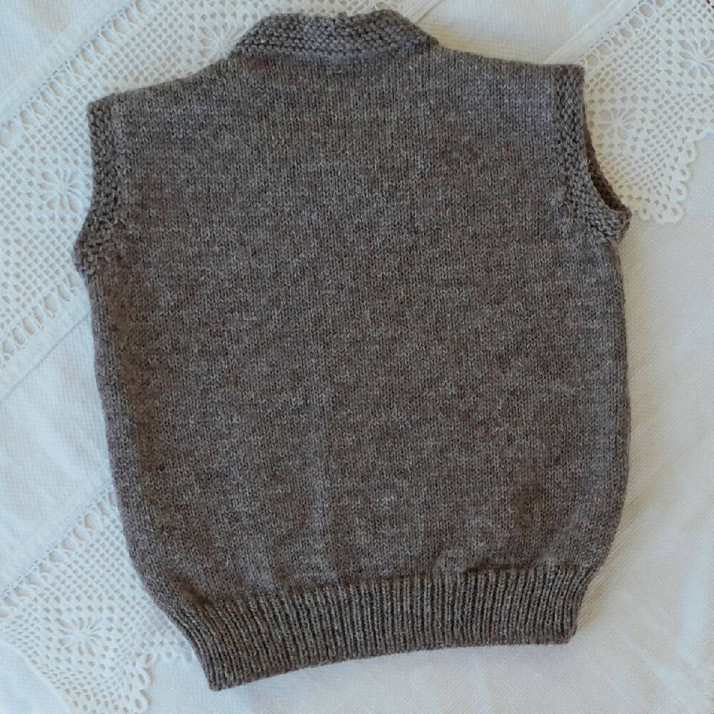 Hand knit sleeveless vest. wool, size 2. Free post