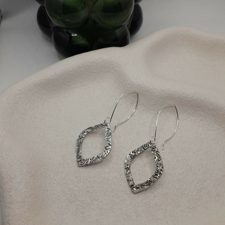 silver monstera hook earrings - handmade silver ear wires