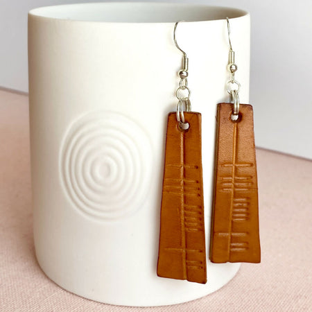 Ogham engraved tan leather dangle earrings