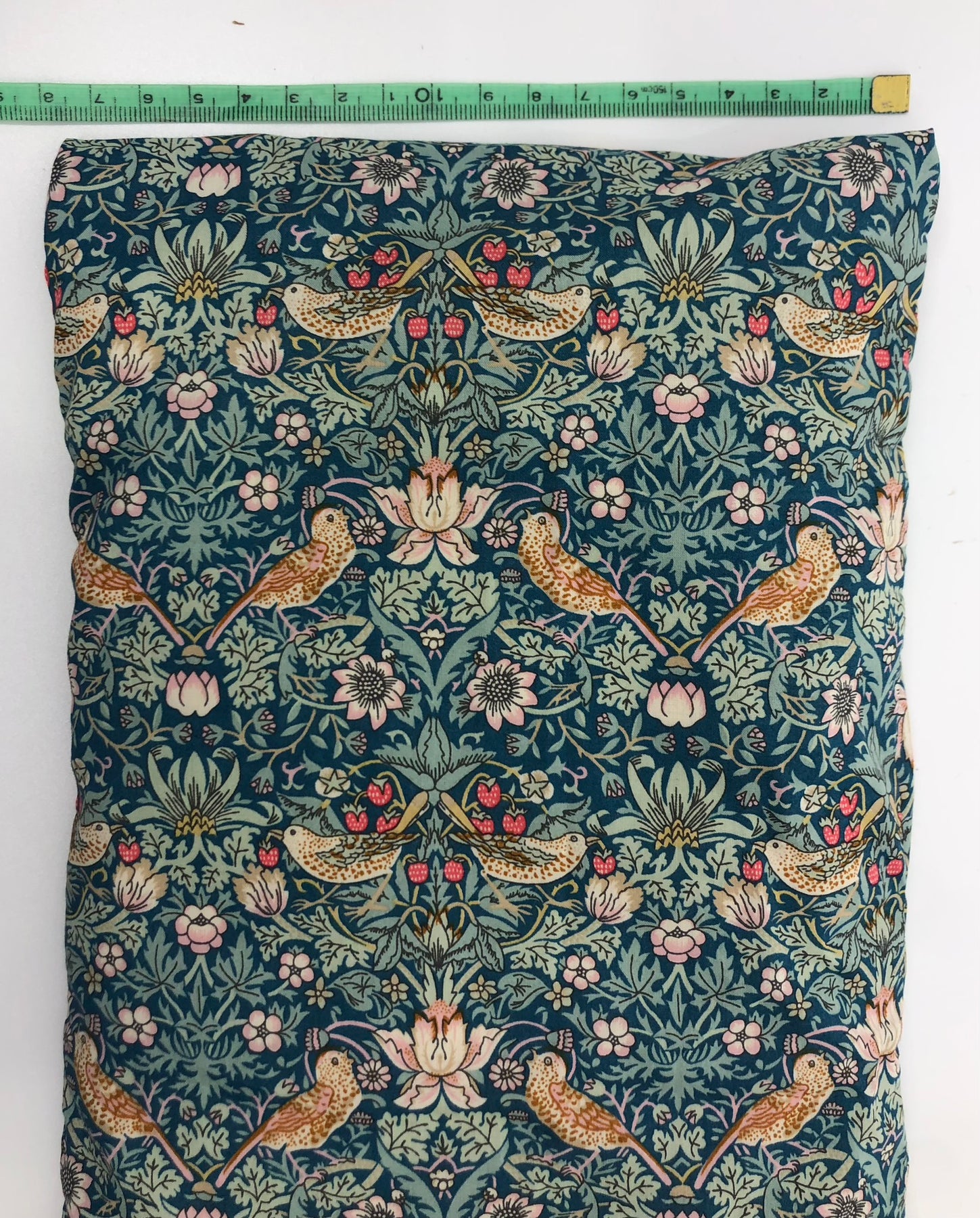 Wheat pack made with Liberty fabric outer layer and wheat in pouch inner layer