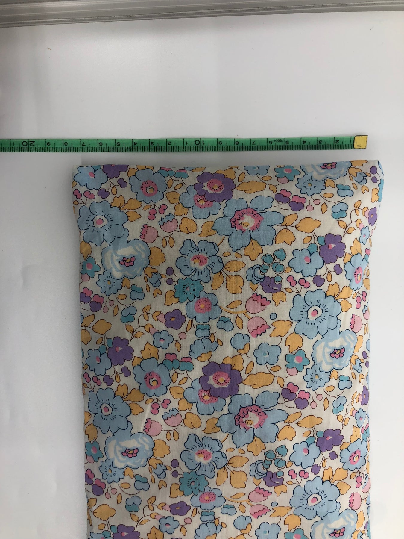 Wheat pack made with Liberty fabric outer layer and wheat in pouch inner layer