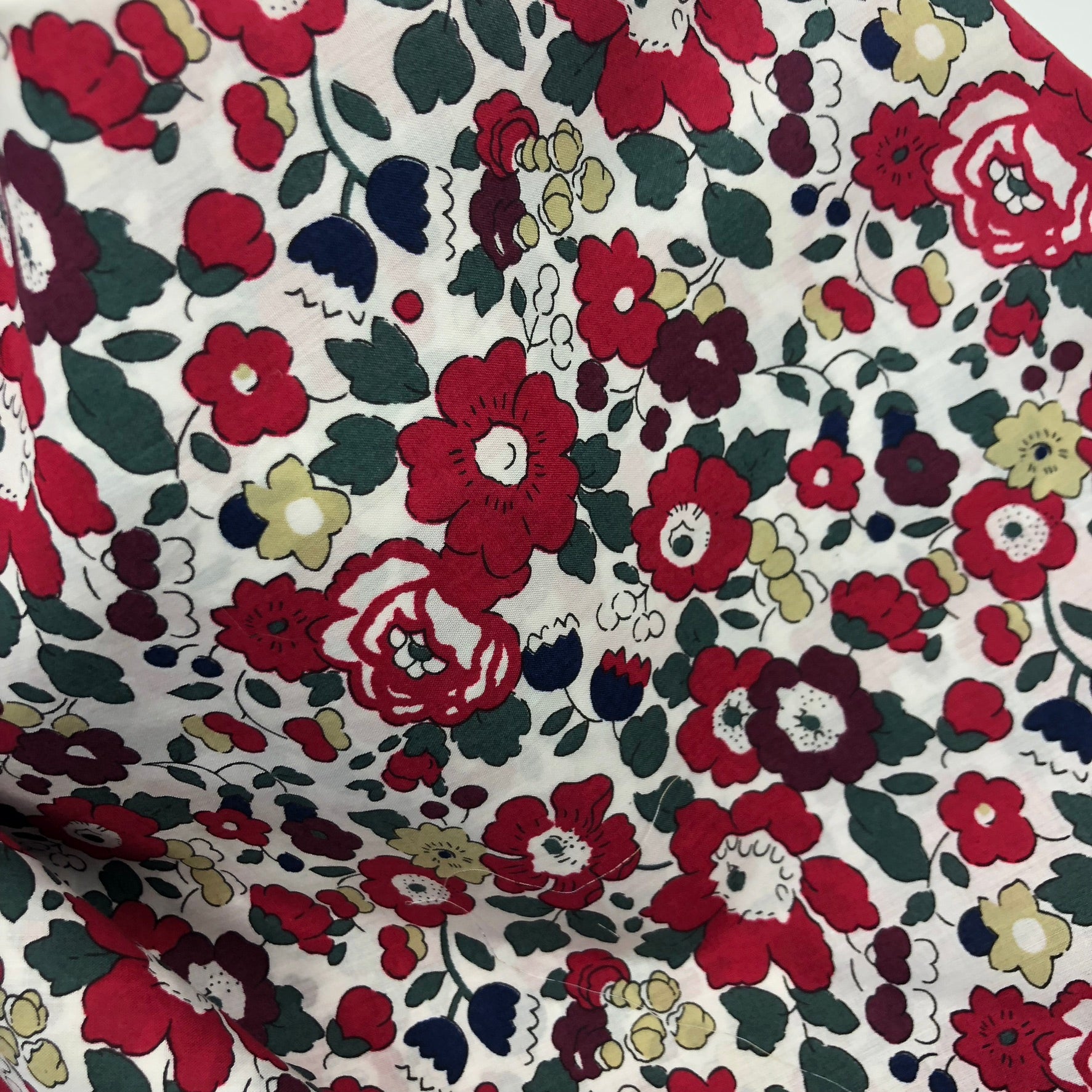 Wheat pack made with Liberty fabric outer layer and wheat in pouch inner layer