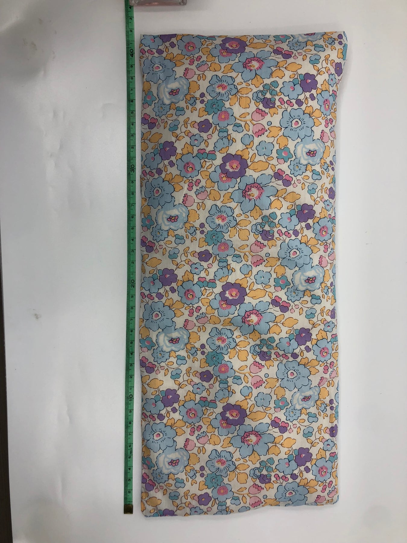 Wheat pack made with Liberty fabric outer layer and wheat in pouch inner layer