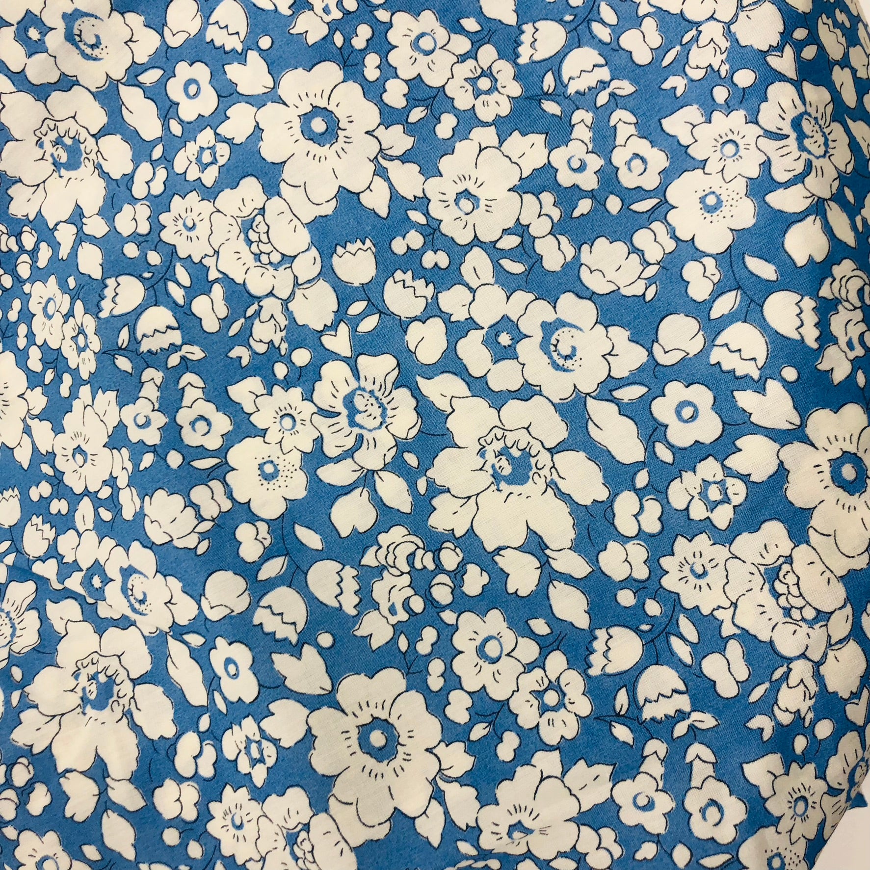 Wheat pack made with Liberty fabric outer layer and wheat in pouch inner layer