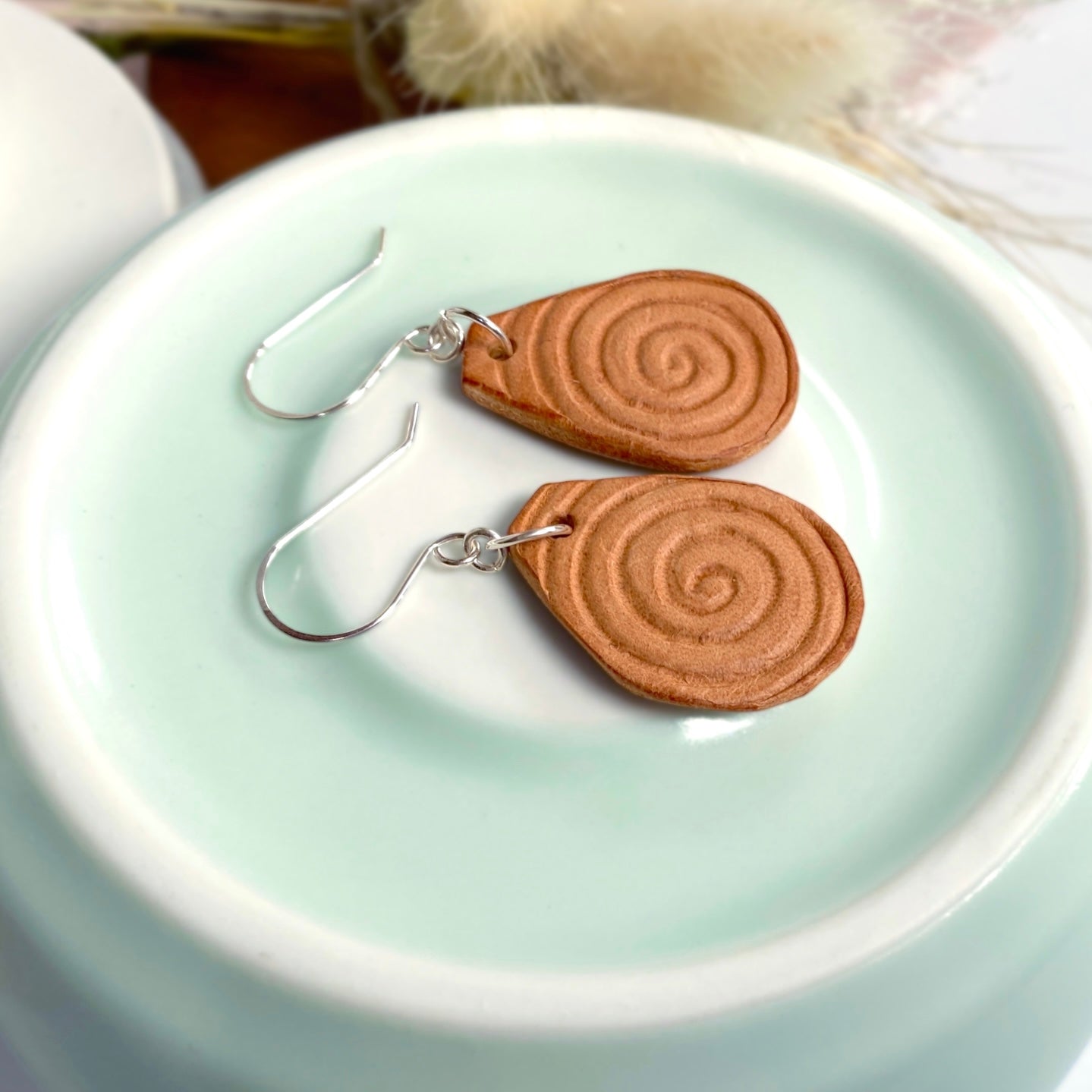 Spiral engraved tan leather | Dangle earrings | Celtic-inspired jewellery