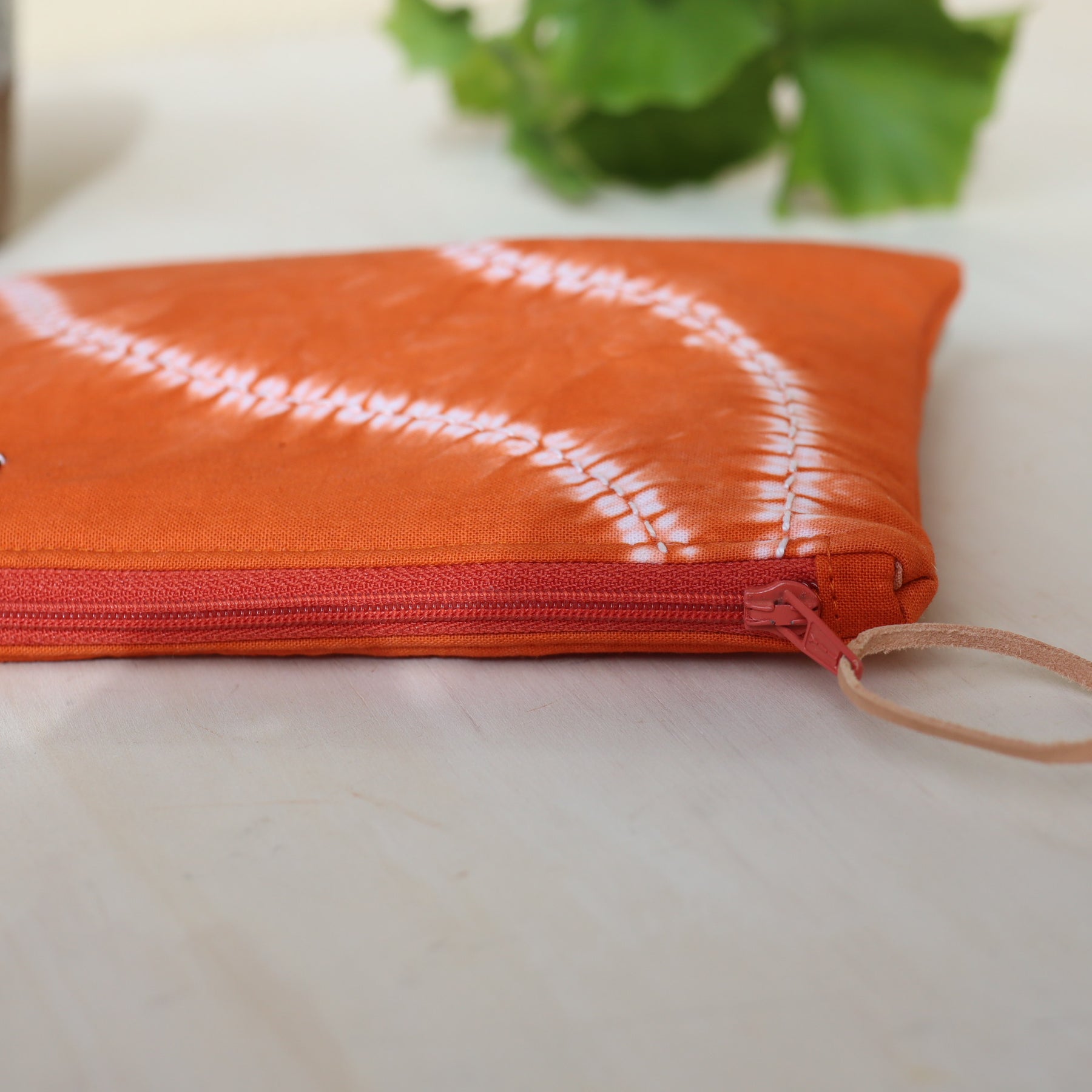 Shibori dyed small zipper pouch, ochre