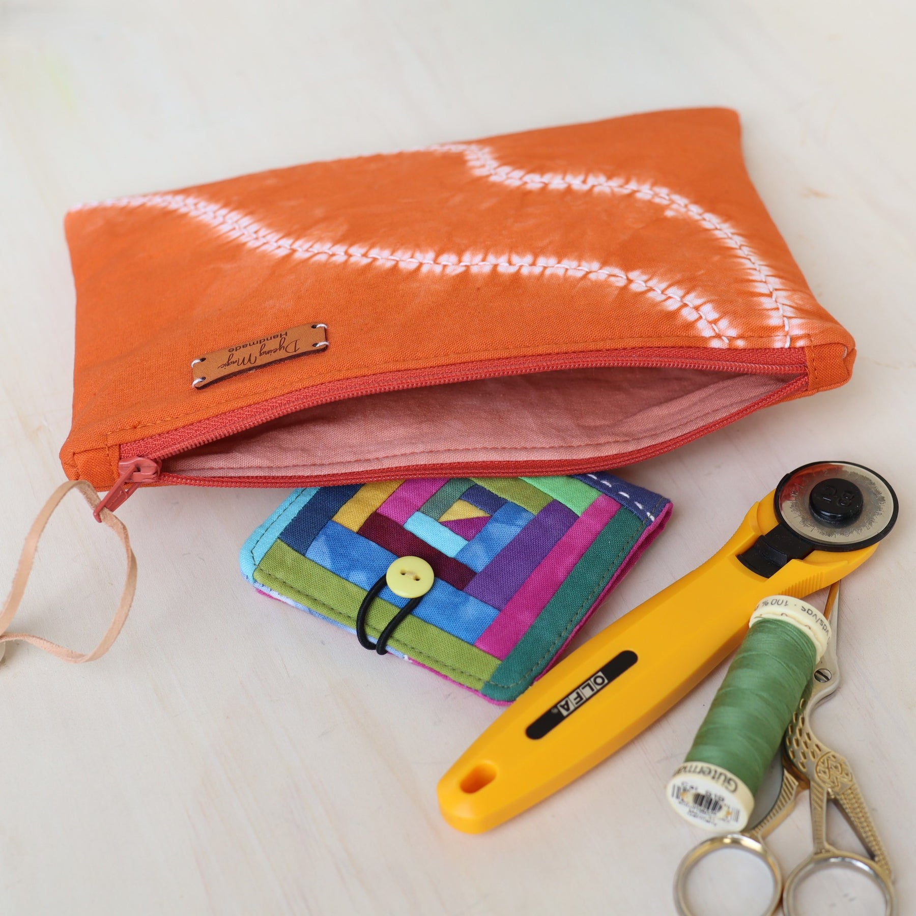 Shibori dyed small zipper pouch, ochre
