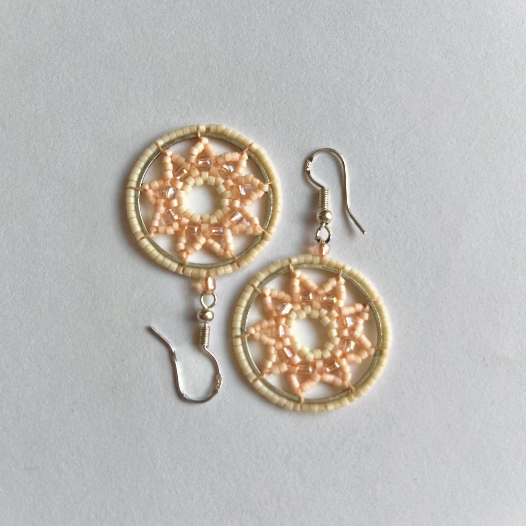 LOTUS OF UNITY | dangle earrings | beaded | star pattern