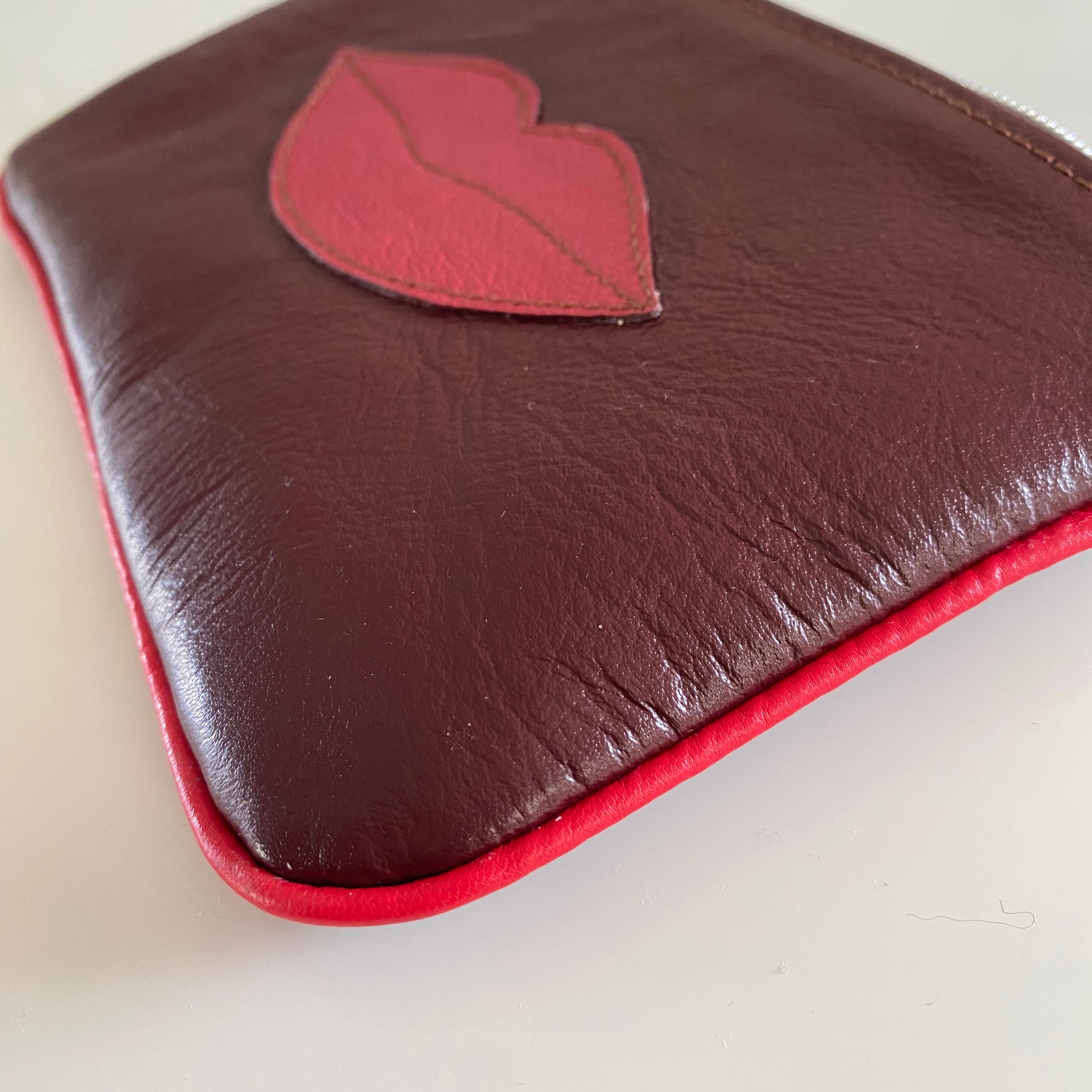 “Kiss” leather makeup bag / pouch
