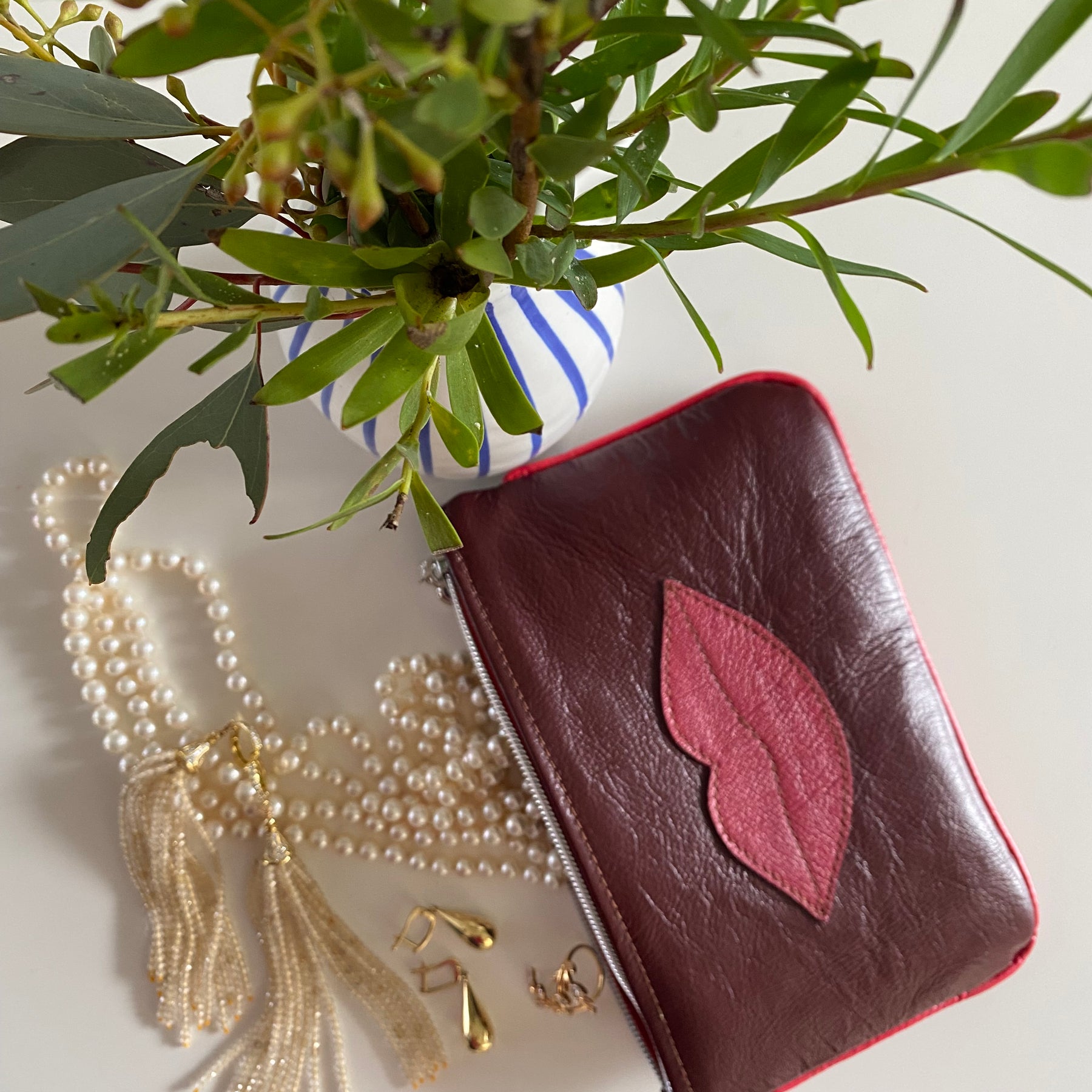 “Kiss” leather makeup bag / pouch