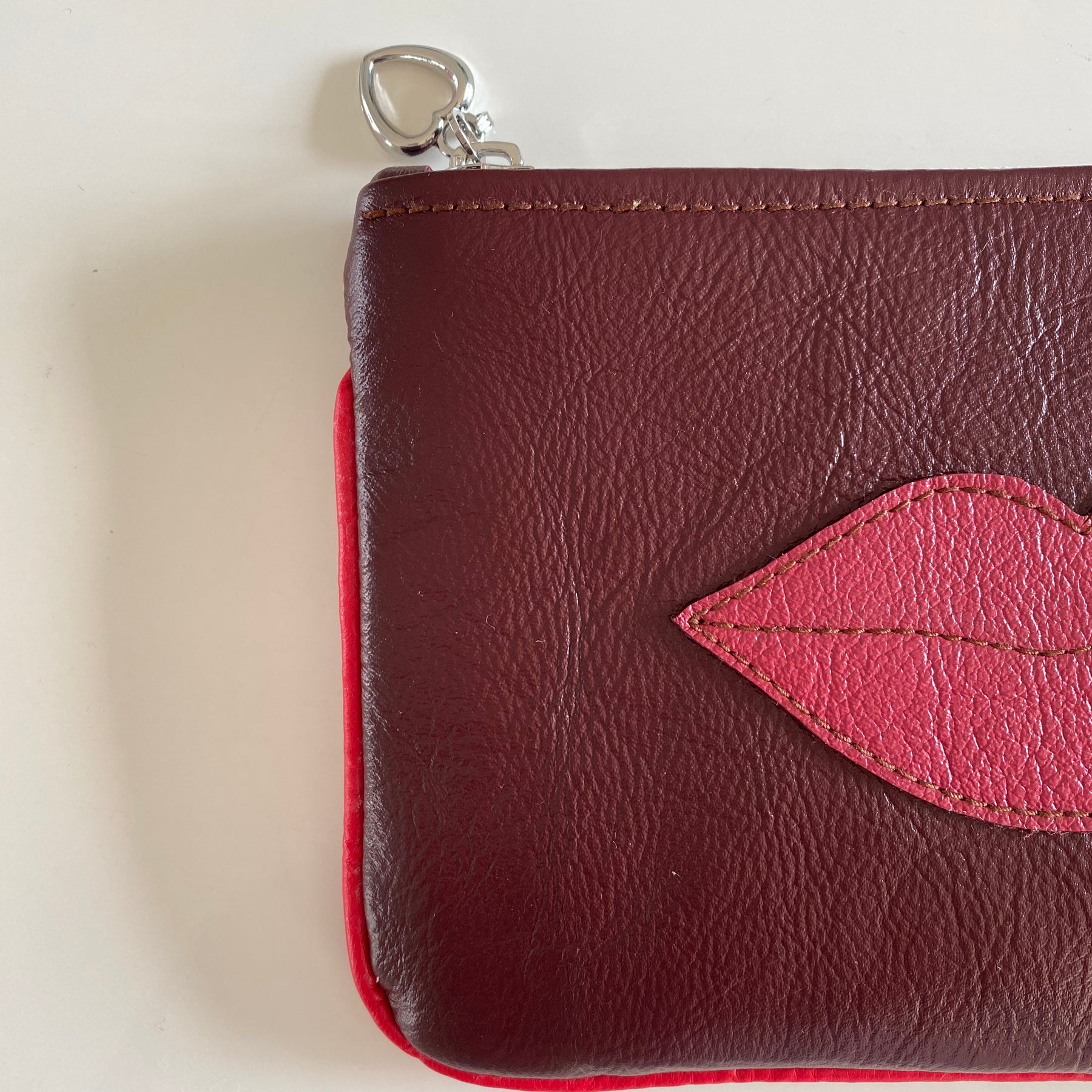 “Kiss” leather makeup bag / pouch