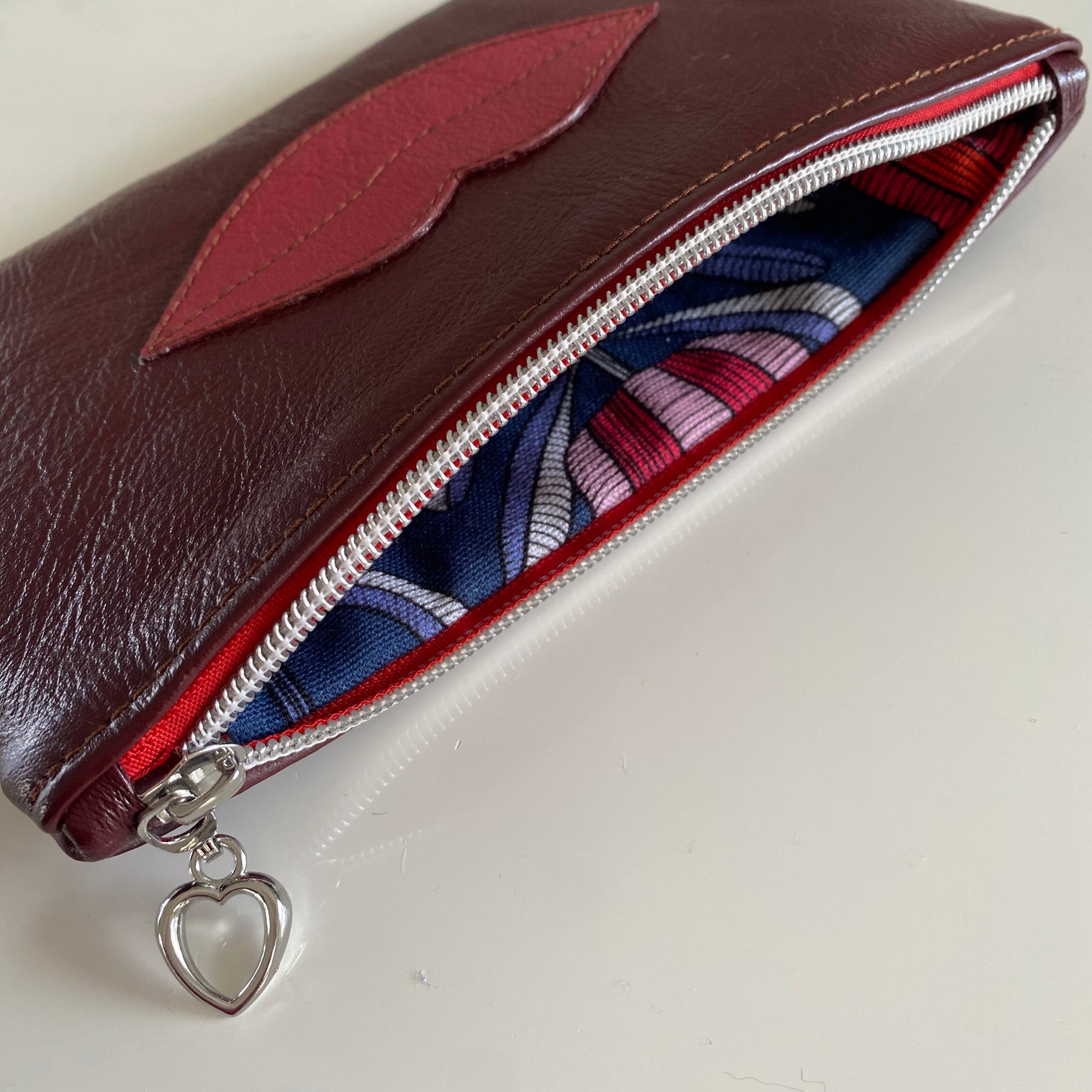 “Kiss” leather makeup bag / pouch