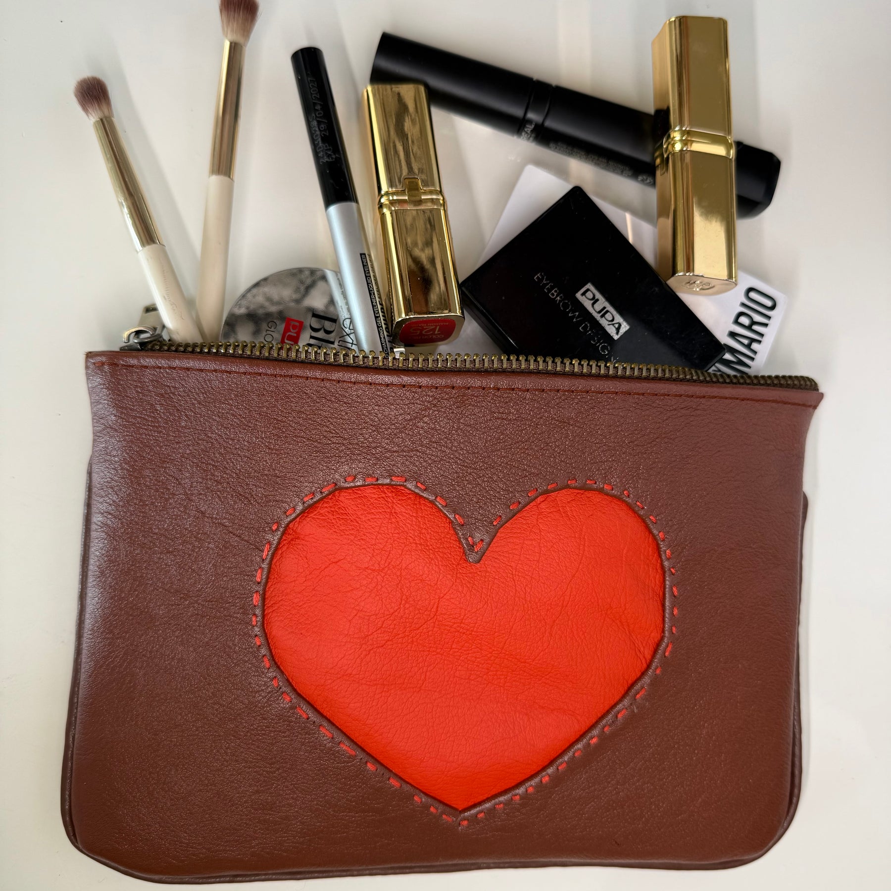Leather pouch / makeup bag ‘Vermilion Heart’