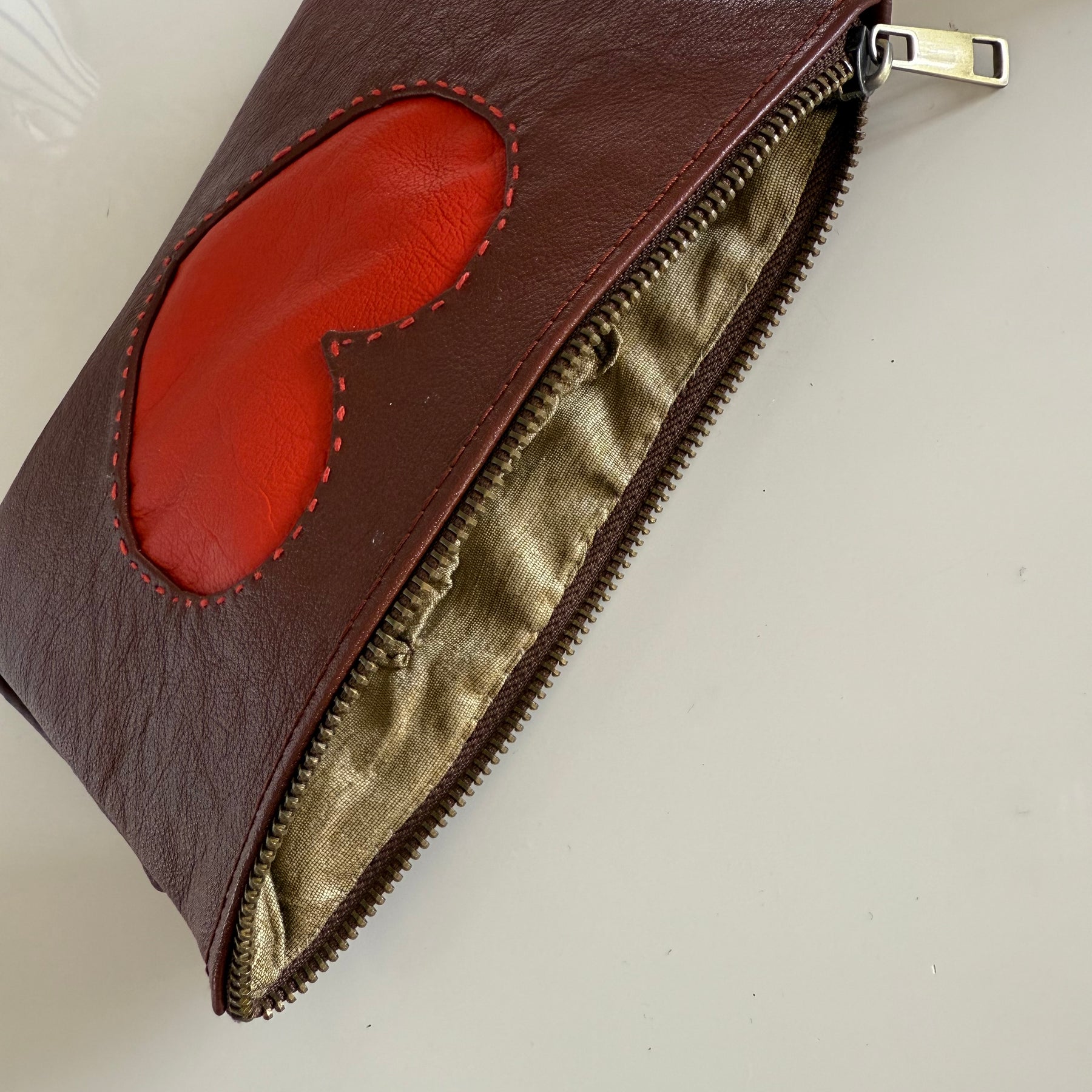 Leather pouch / makeup bag ‘Vermilion Heart’