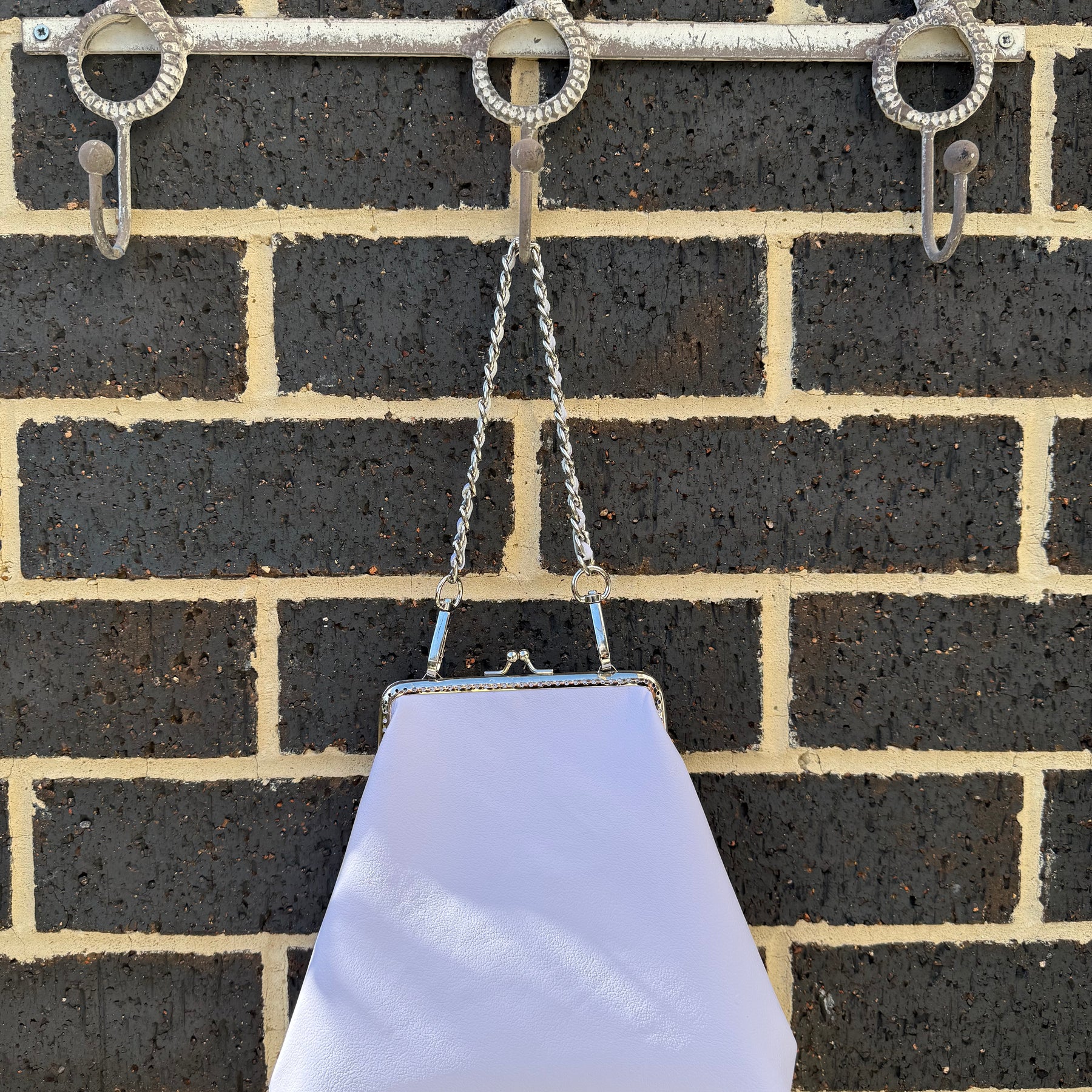 Metal frame ‘Lavender lollipop’ purse