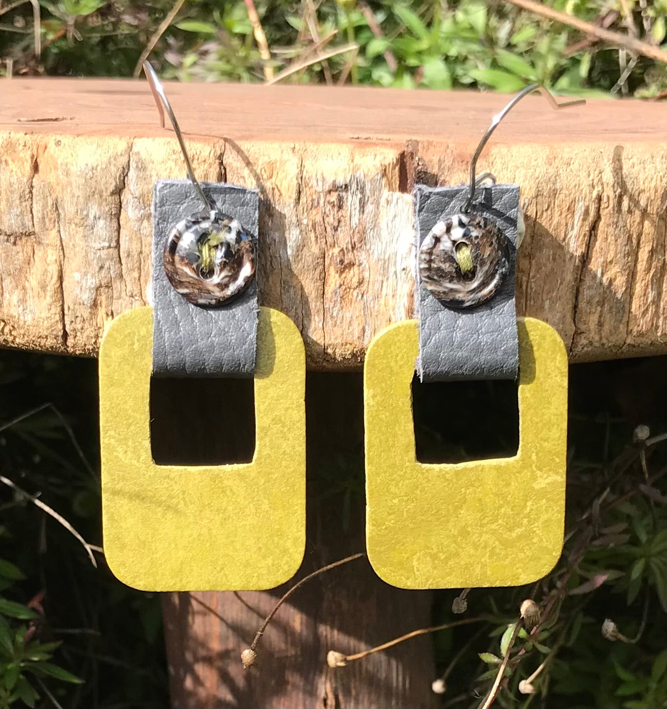 Handmade earrings made with flooring