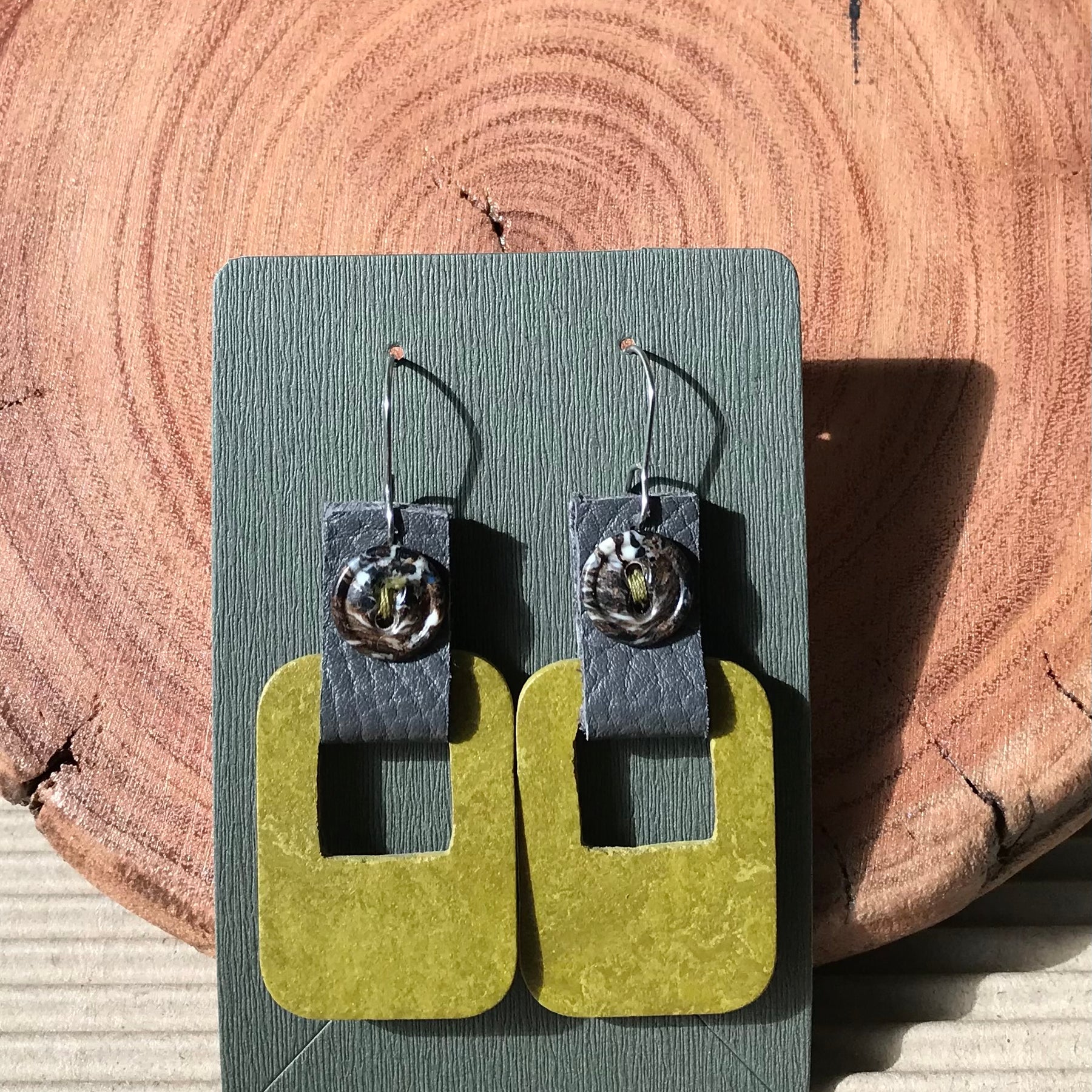 Handmade earrings made with flooring