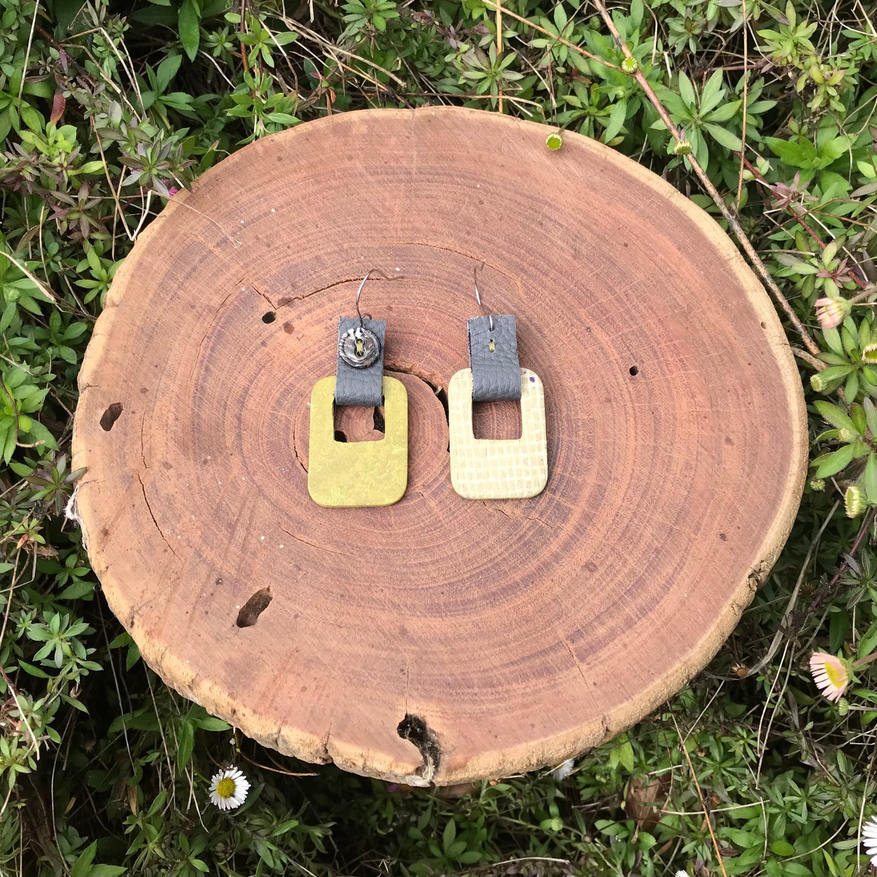 Handmade earrings made with flooring