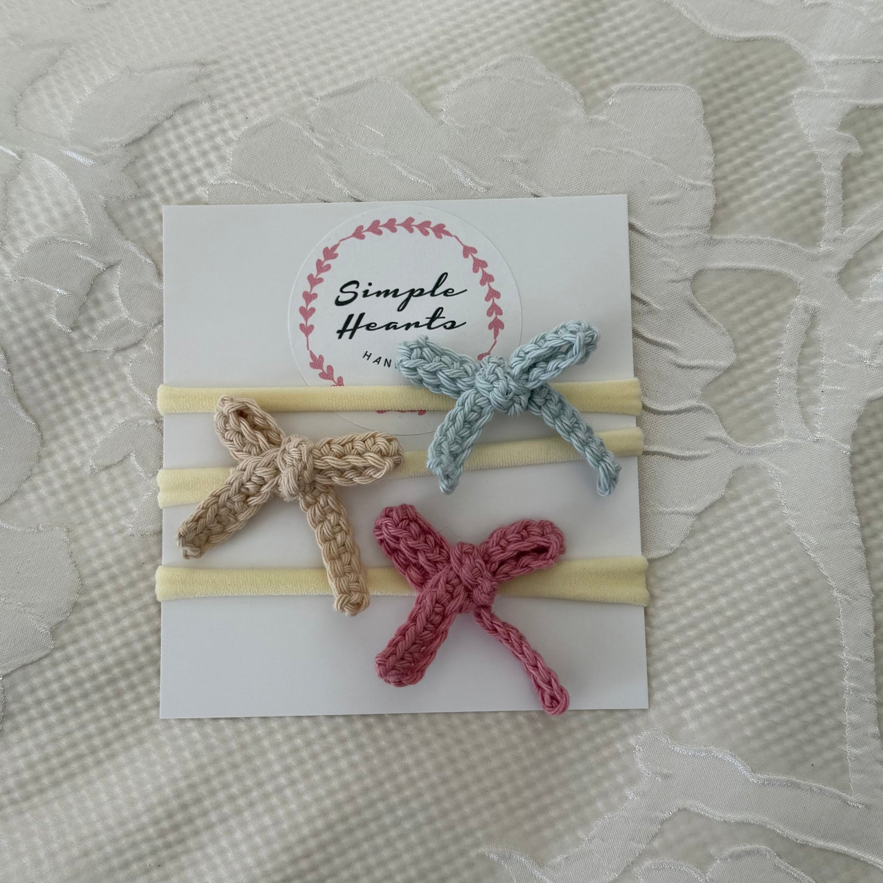 Crocheted bow headband set for baby