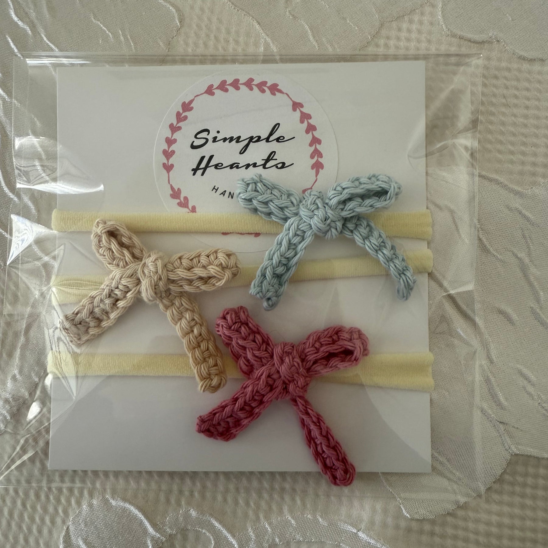 Crocheted bow headband set for baby