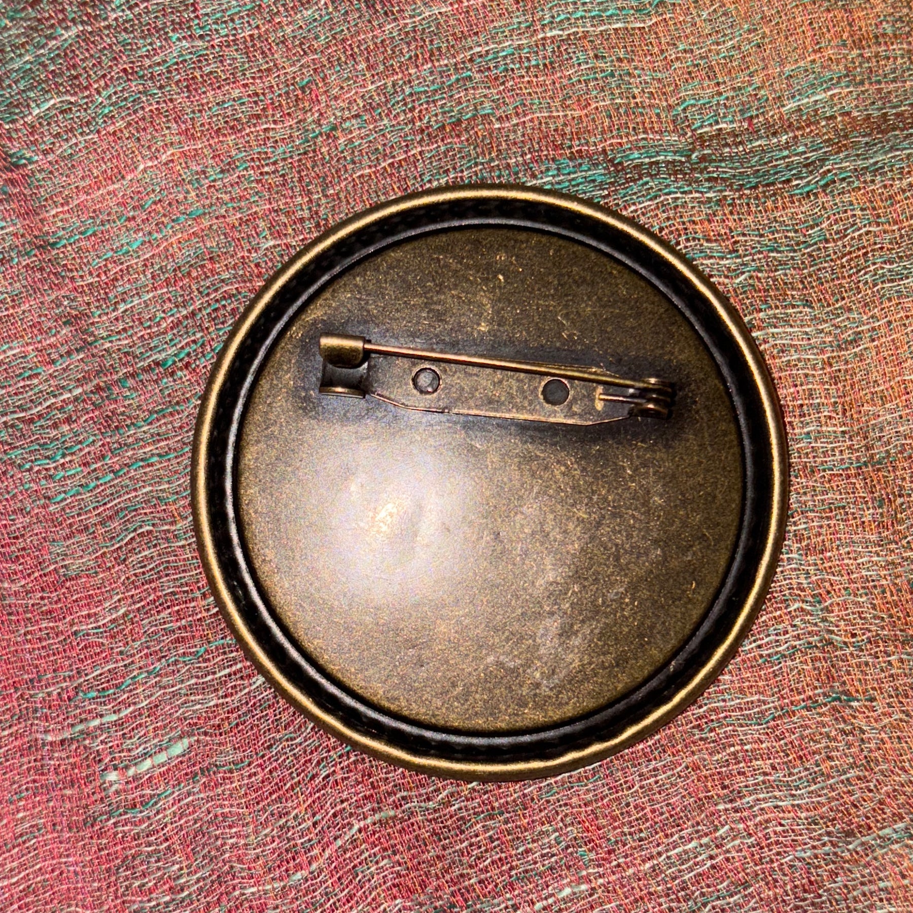Classic navy and white handstitched brooch